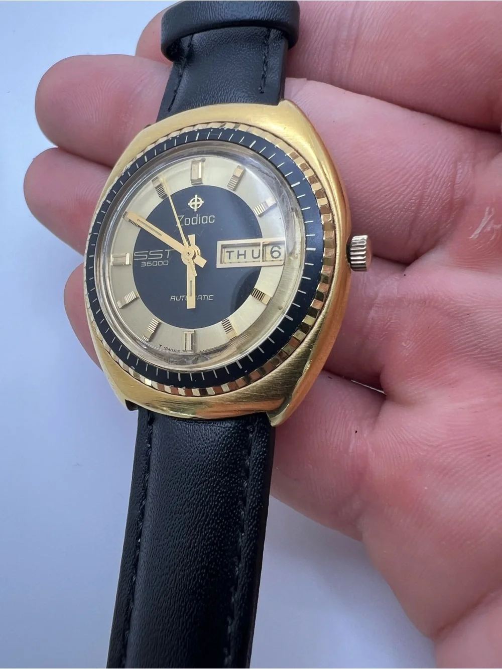 Zodiac Gold Tone Watch with Black Dial